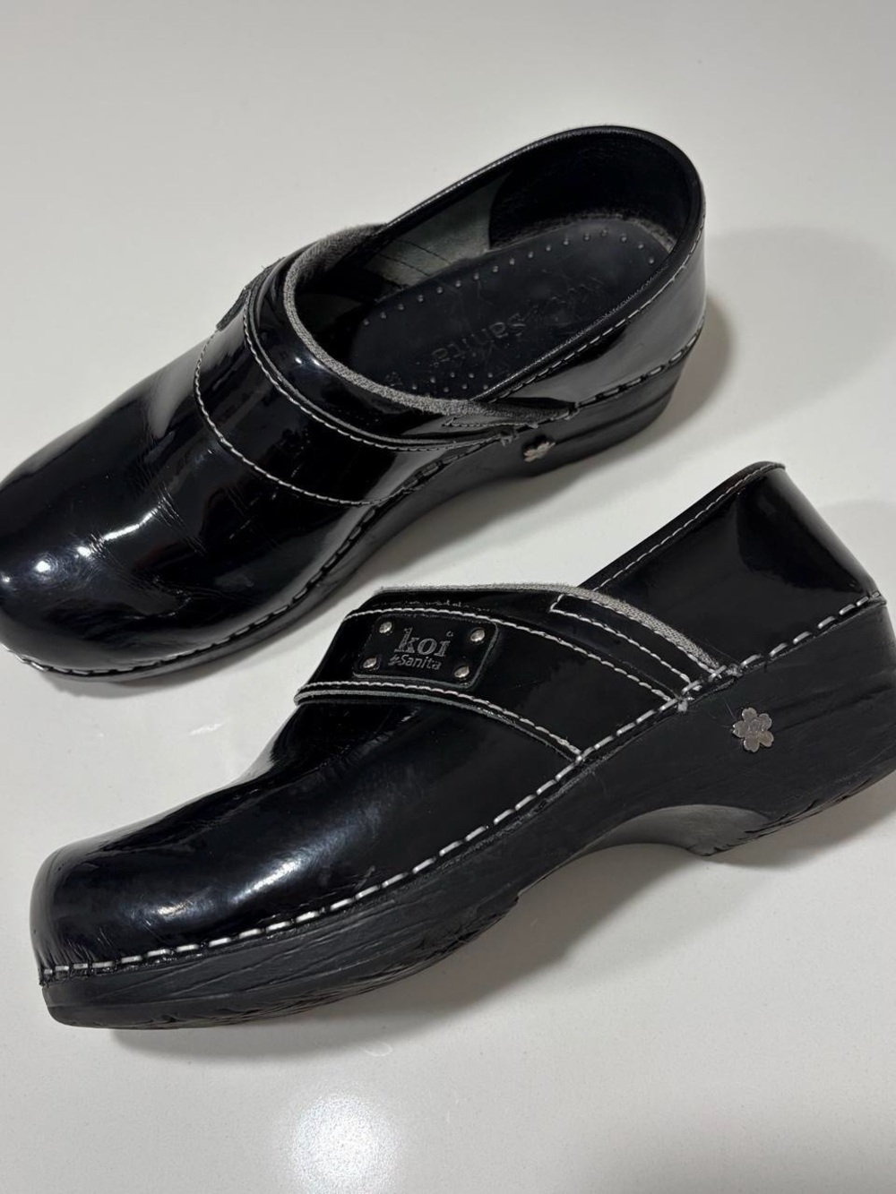 Sanita Black Patent Clogs with Contrast Stitching